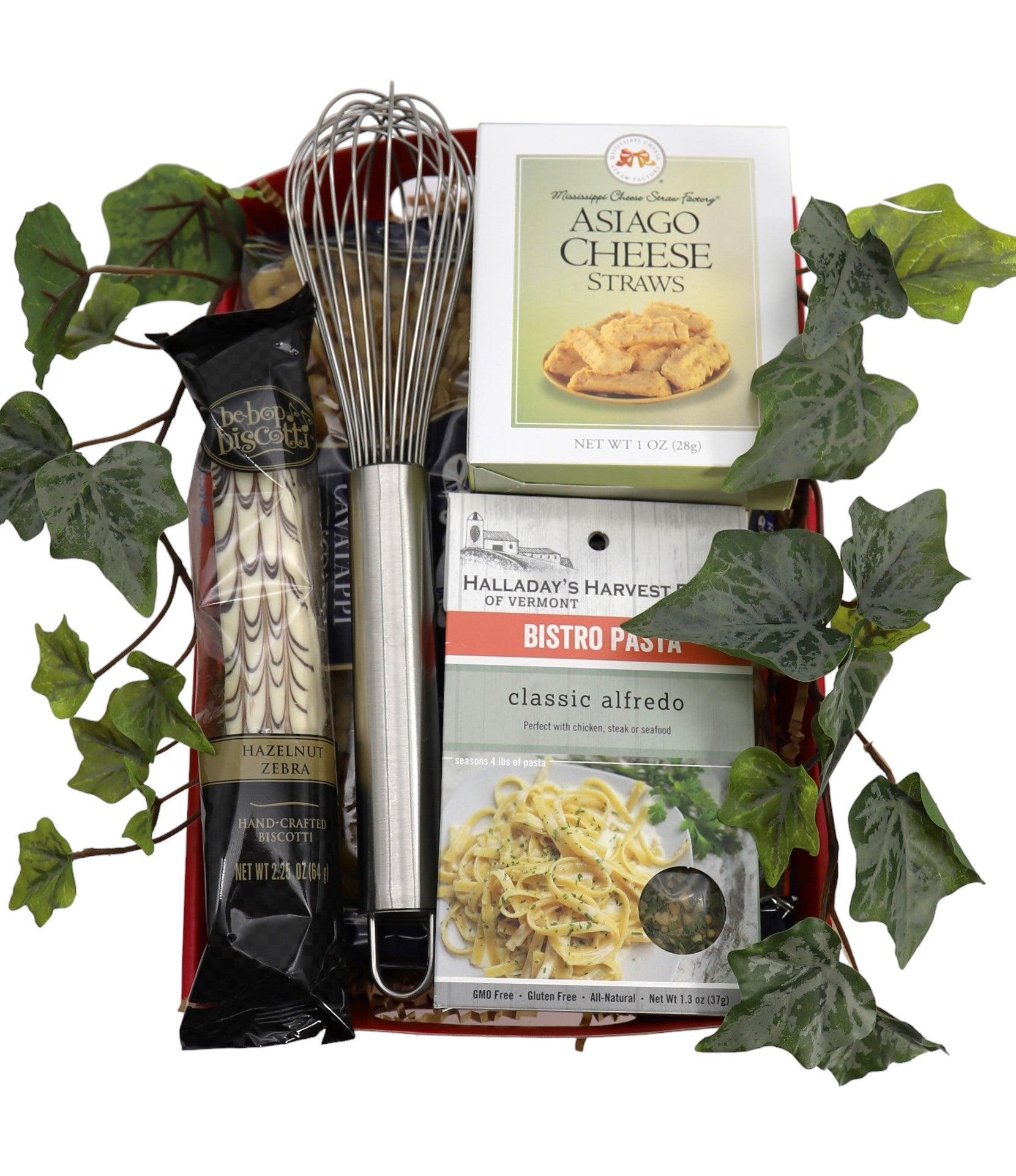 Gift tray with metal whisk, Bistro Pasta bag, and Asiago cheese straw packet, with leaves