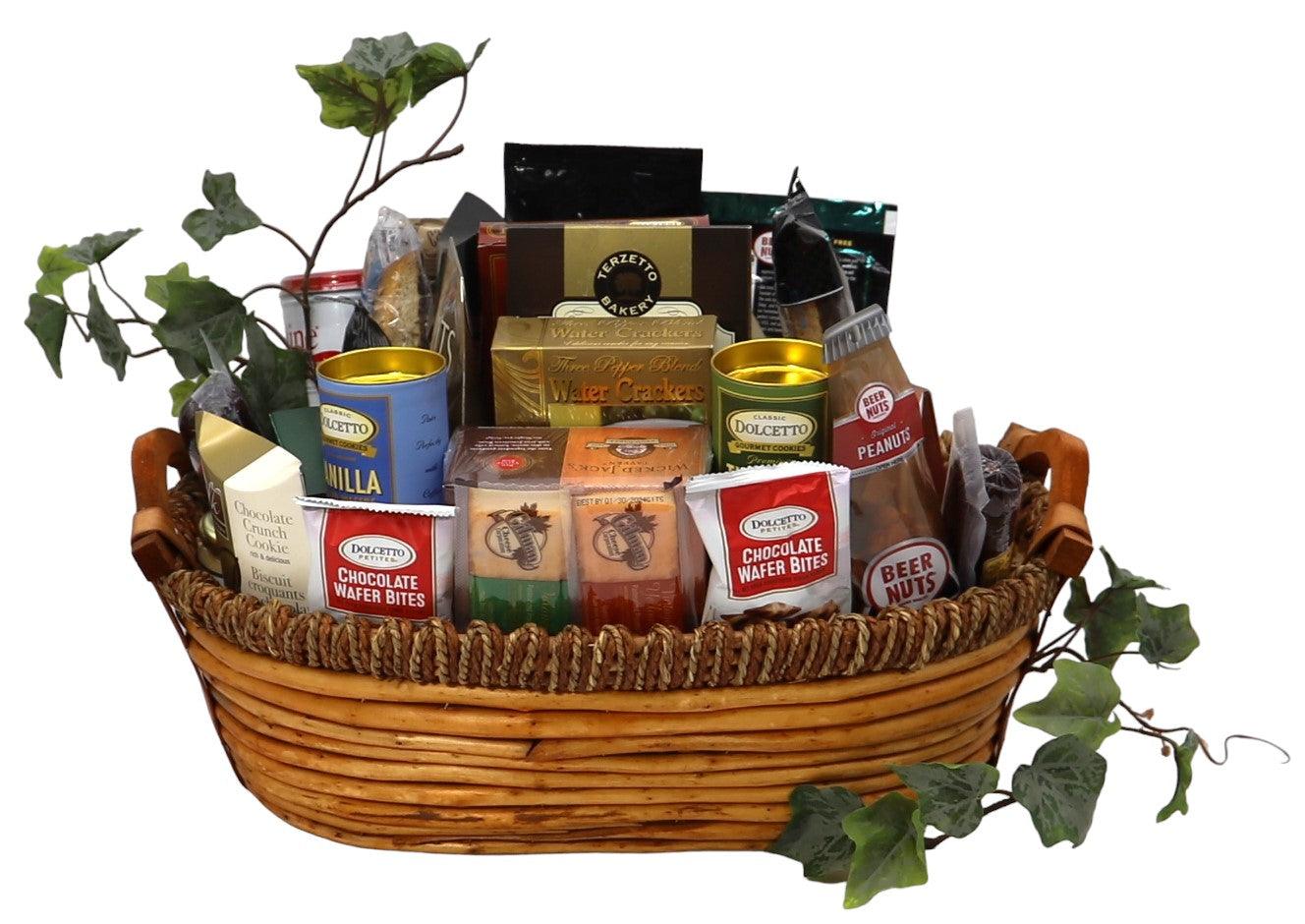Gift basket with wrapped snacks and cookies in a woven basket