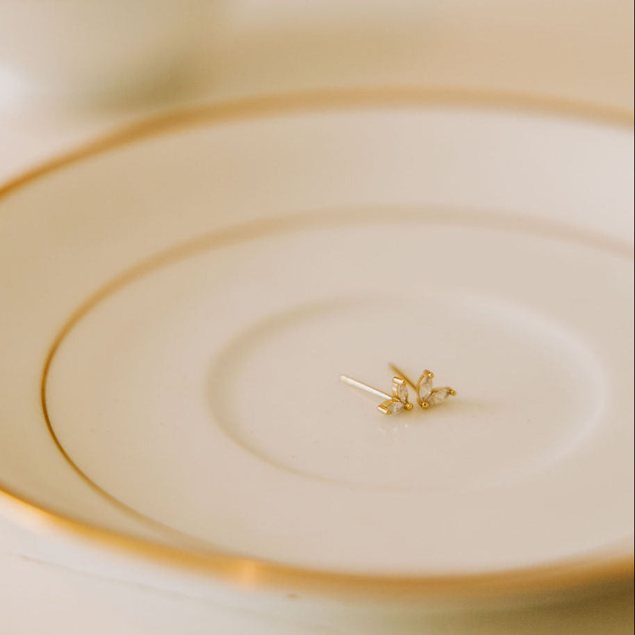 Gold Quinn stud earrings shown from the back with straight posts