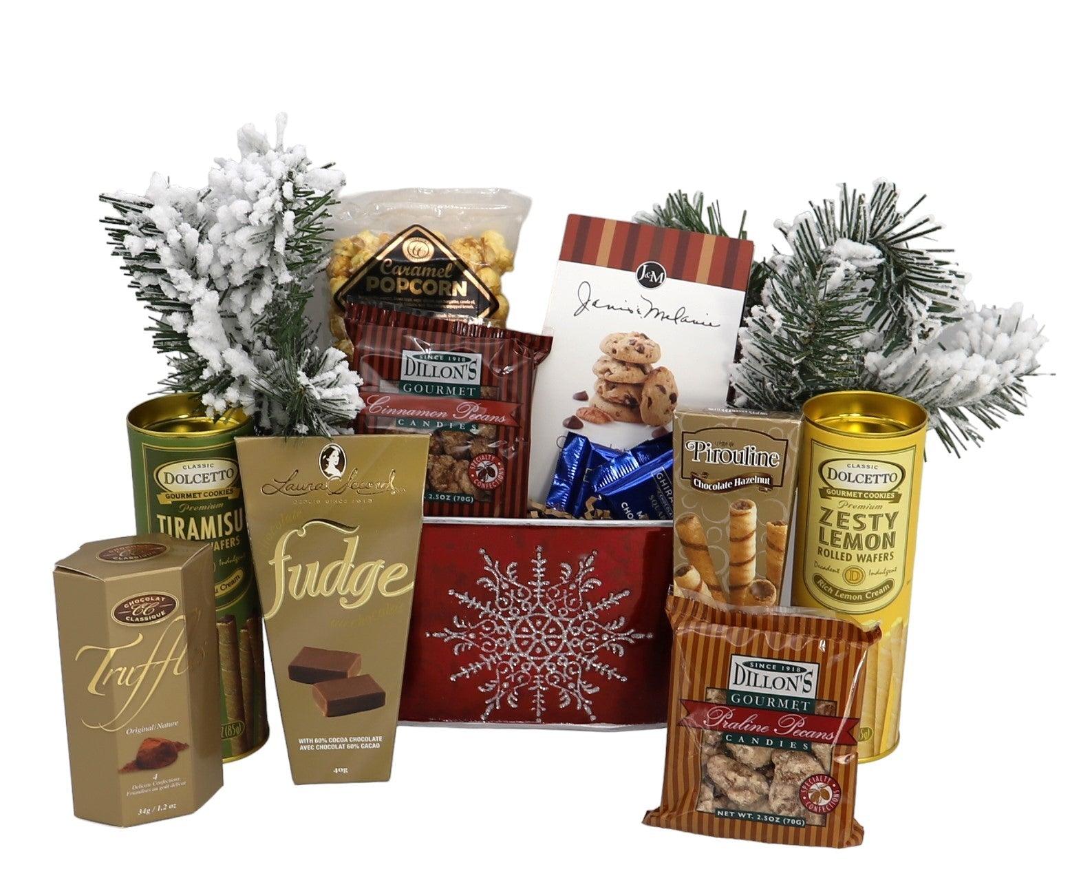 Christmas gift basket with red snowflake design, chocolates, snacks, and gold cans