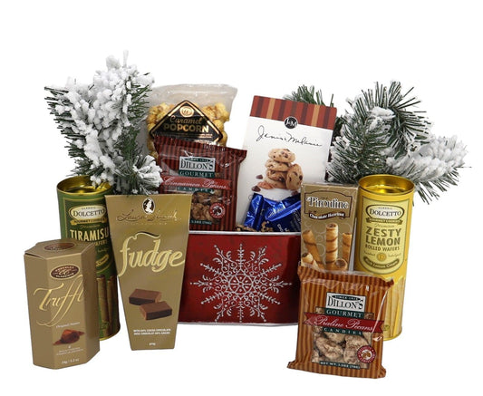 Christmas gift basket with red snowflake design, chocolates, snacks, and gold cans