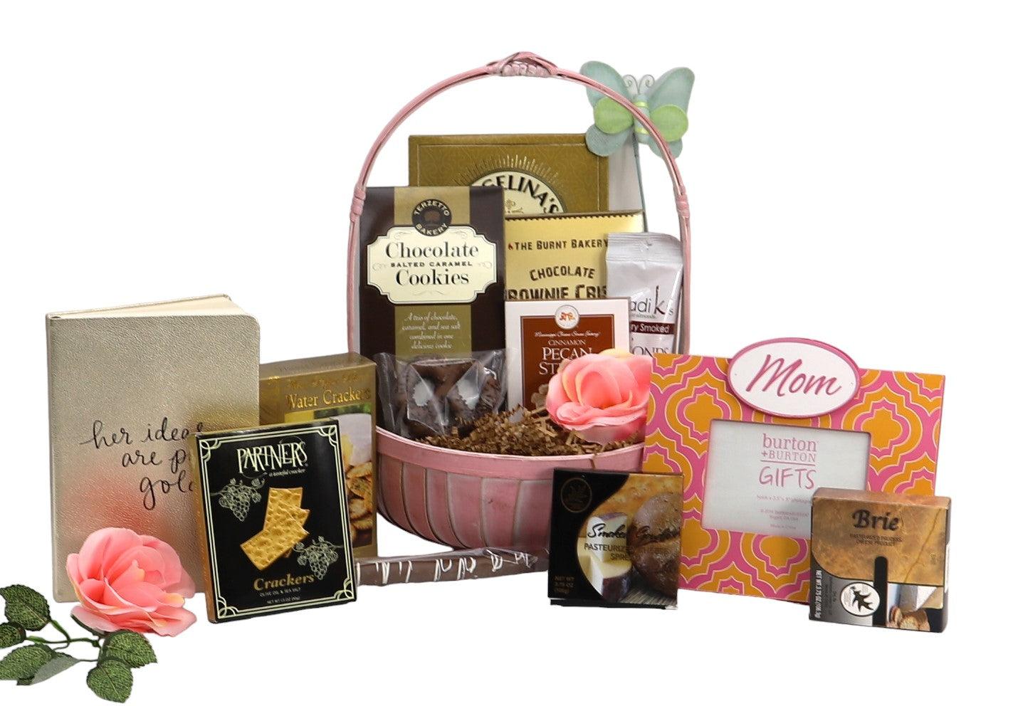 Mother’s gift basket with pink handle, cookies, crackers, and chocolates