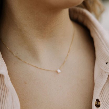 Melbourne Pearl Necklace with a fine gold-tone chain and single round white pearl