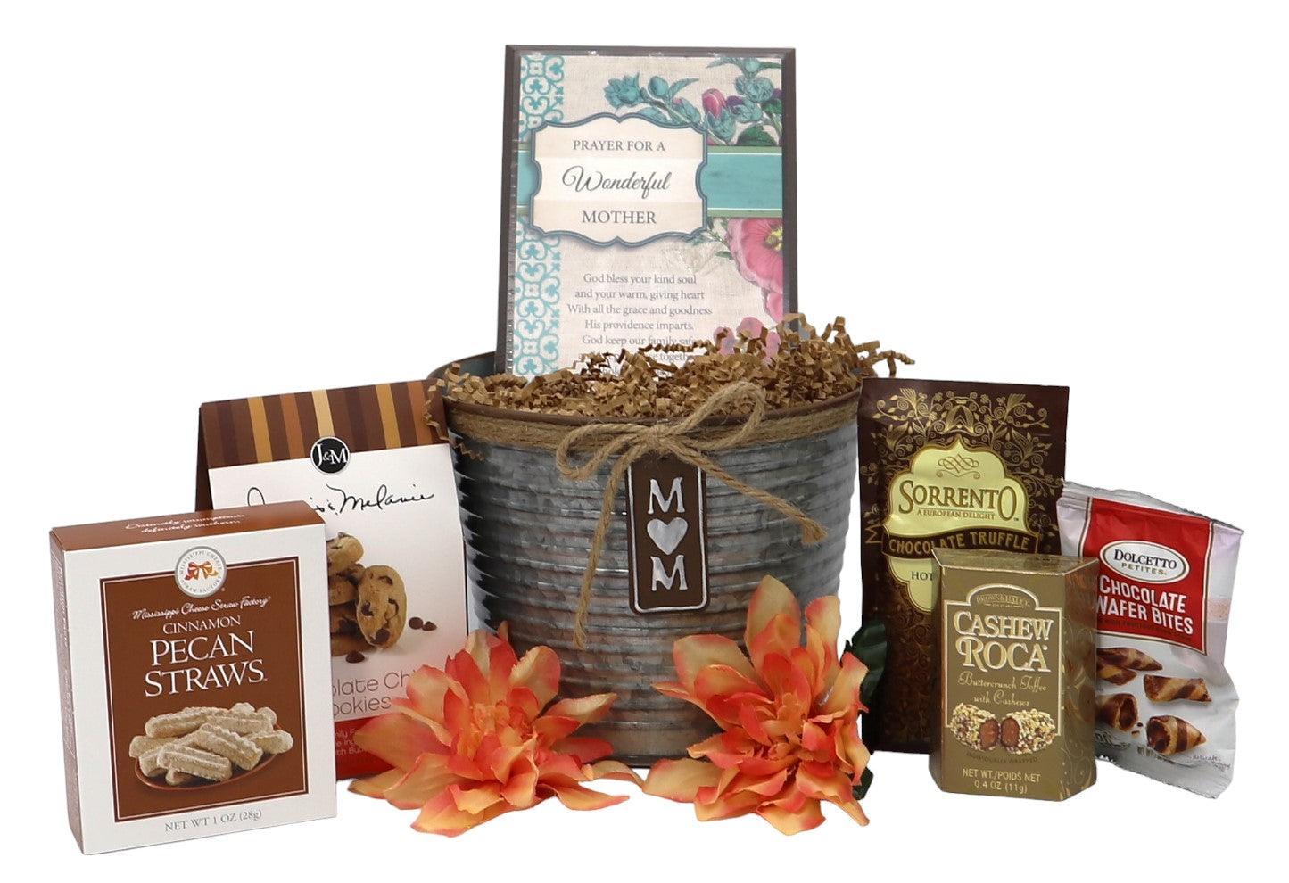 Gift tin basket set with gray container, orange flowers, and multiple gourmet treats.