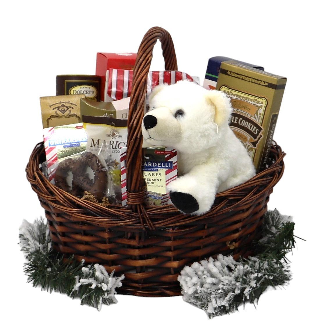 Deluxe Christmas gift basket with wicker basket and plush polar bear, surrounded by chocolate