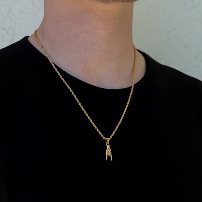 Gold layered necklace set with small horn-hand charm