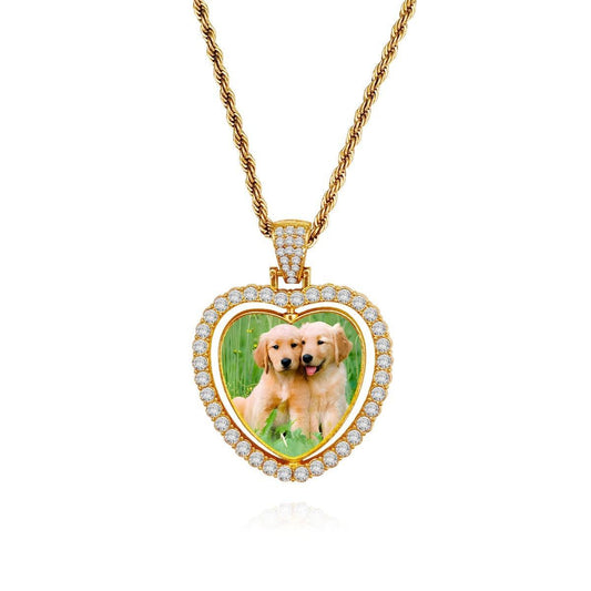 Gold heart photo pendant necklace with rhinestone border and small hanging charm