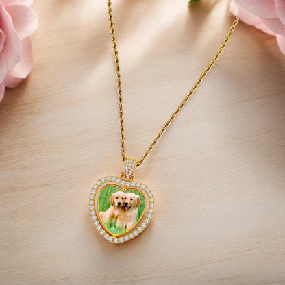 Gold heart pendant necklace with rhinestone bezel and inset photo window