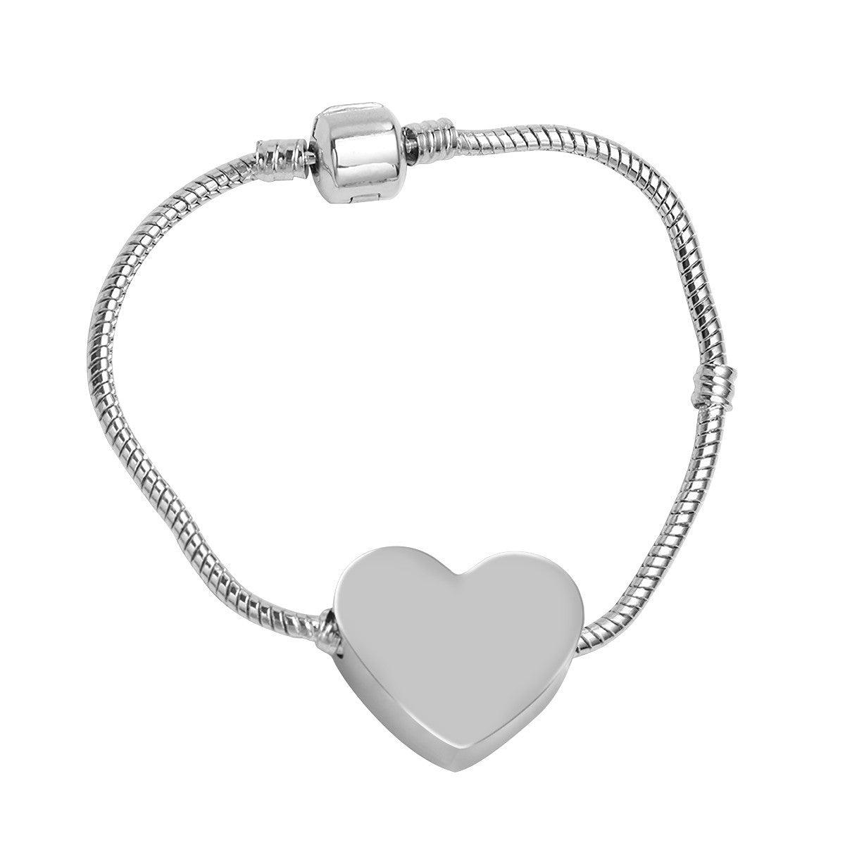 Silver snake chain bracelet with heart-shaped pendant back, smooth blank metal finish