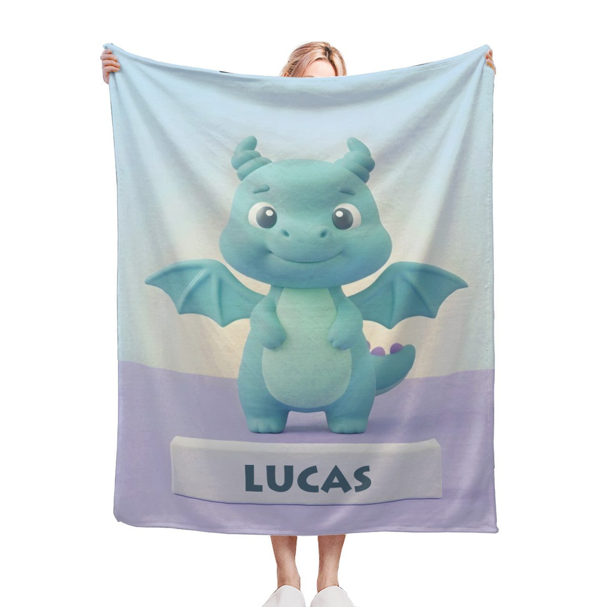 White, blue, and lavender kids blanket with cute dragon and “LUCAS” print
