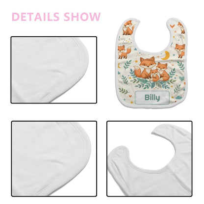 Baby bib detail view: fox print with Billy name patch and white fabric edge
