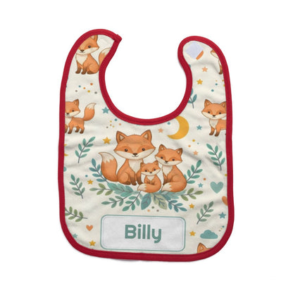 Red-edged baby bib with fox family print and Billy name patch