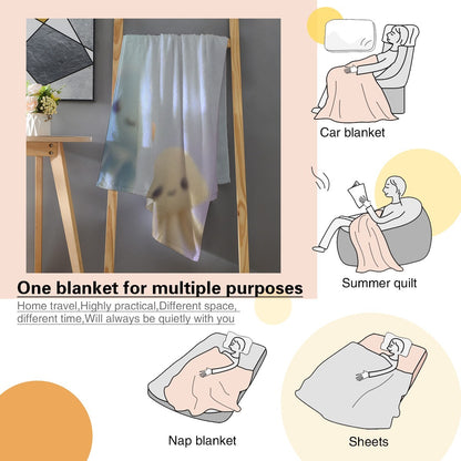 Light blue octopus-themed blanket shown hanging, with octopus faces and Lindsey print