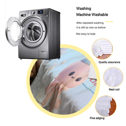 Octopus-themed blanket with octopus faces and Lindsey print, shown near washing machine