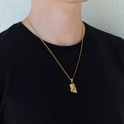 Gold Jesus charm pendant necklace with small portrait detail