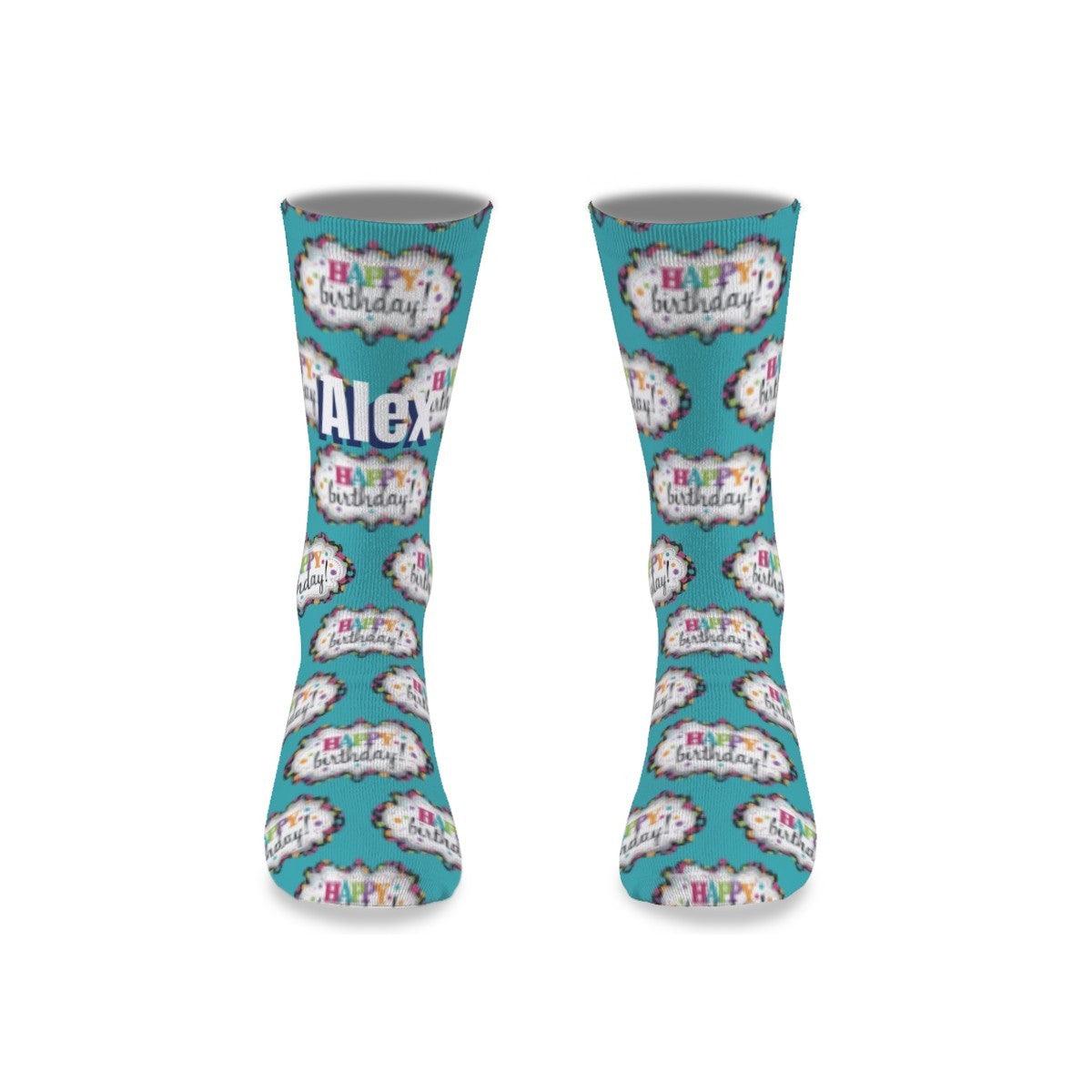 Teal birthday novelty socks with repeating cake and Happy Birthday medallion print