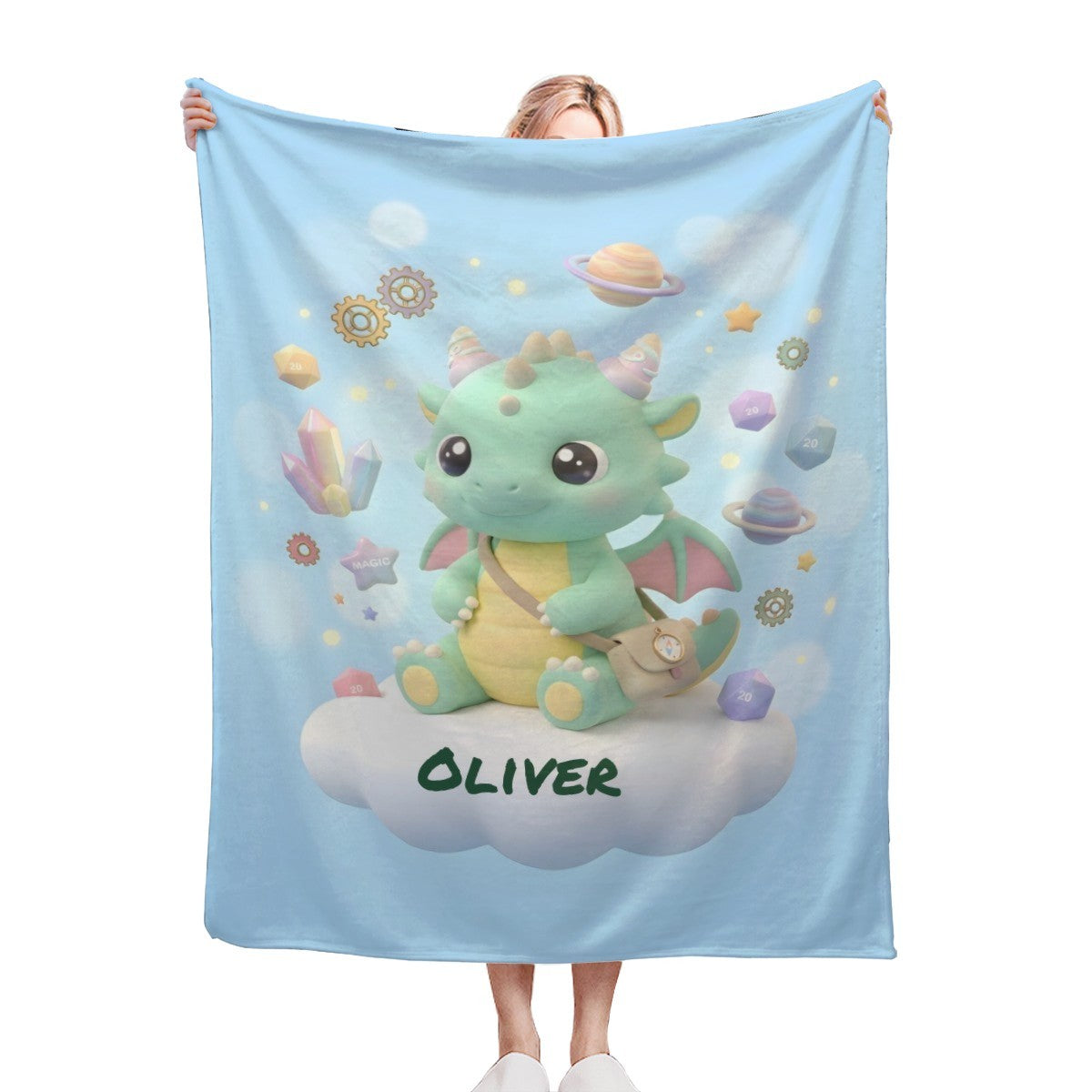 Light blue kids blanket with cute green dragon and Oliver text on a cloud