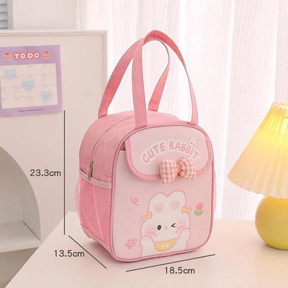 Pink insulated animal lunch bag with bow front pocket and bunny illustration, size diagram shown