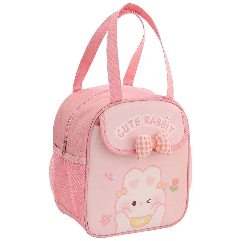 Pink insulated animal lunch bag with bow front pocket and bunny illustration, close-up view