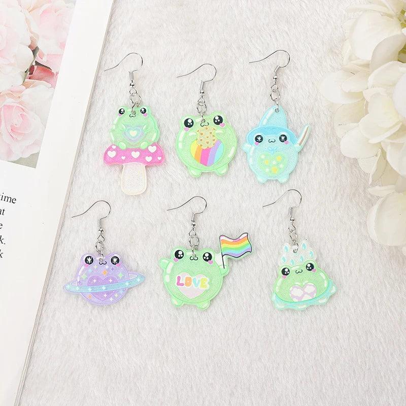 Frog acrylic earrings assortment with dangling frog charms in green, pink, blue, and rainbow colors