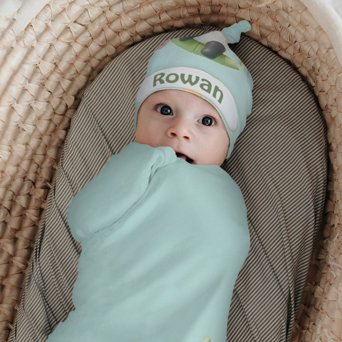Mint swaddle blanket with panda and cloud design; Rowan name on matching hat