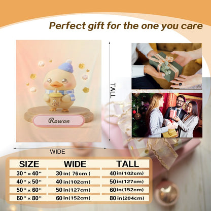 Duck character blanket size chart with light beige print of duck in blue hat and name ribbon