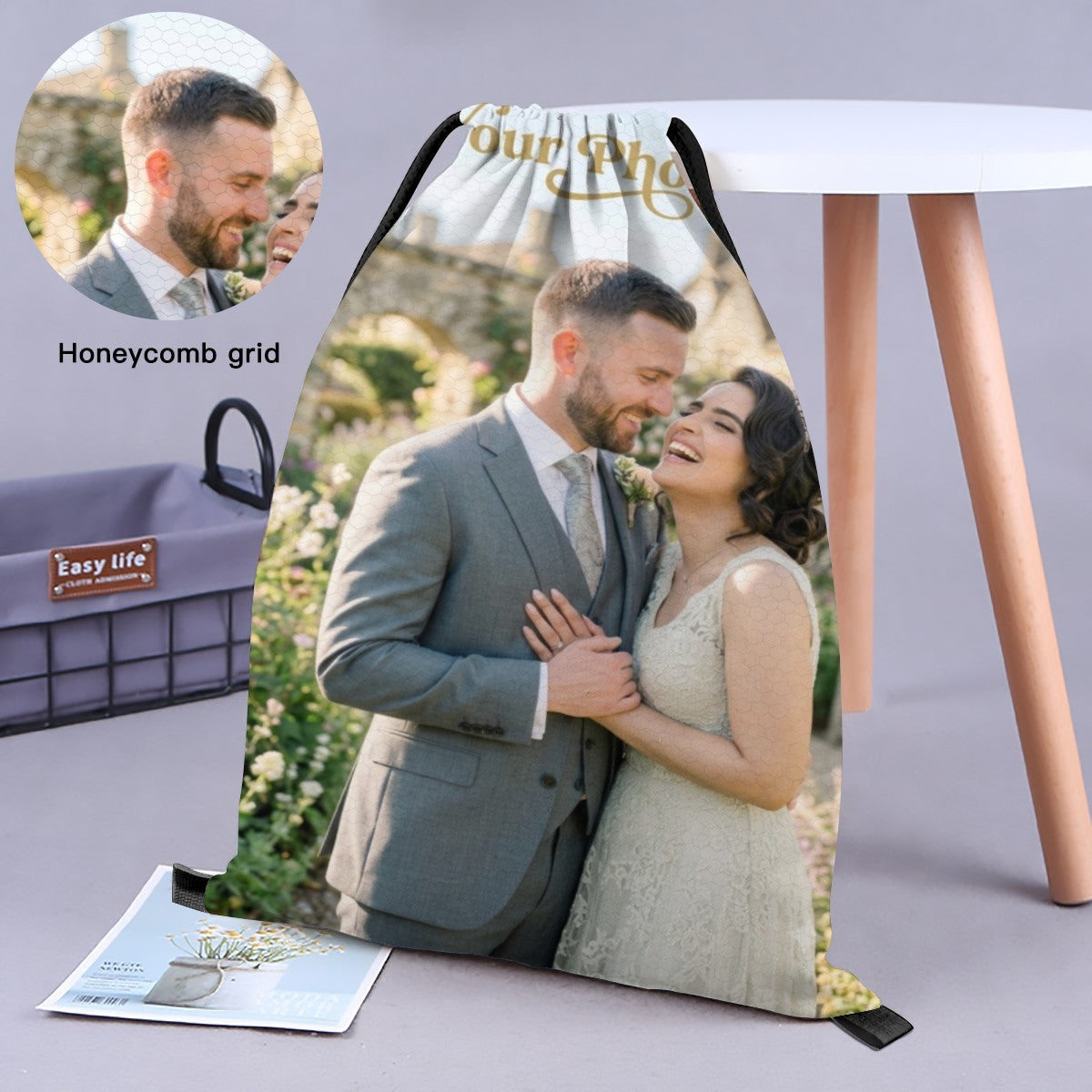 Black drawstring photo bag with custom couple image panel and side loop handles