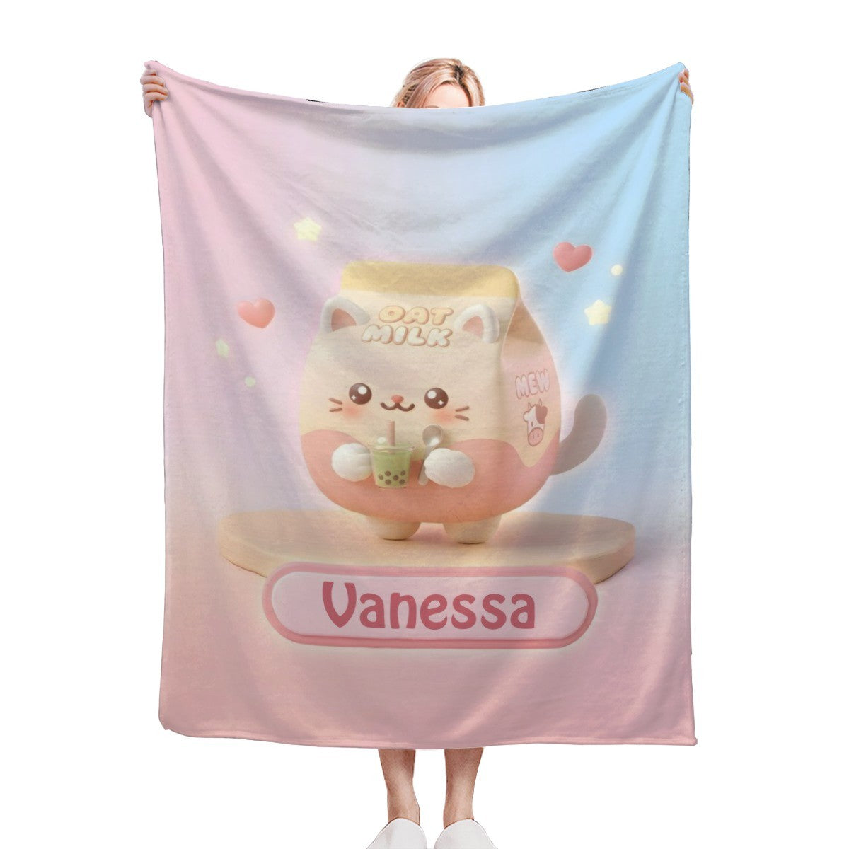 Pastel blanket with pink-and-blue sides and cute bunny graphic, “Vanessa” label