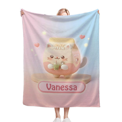 Pastel blanket with pink-and-blue sides and cute bunny graphic, “Vanessa” label