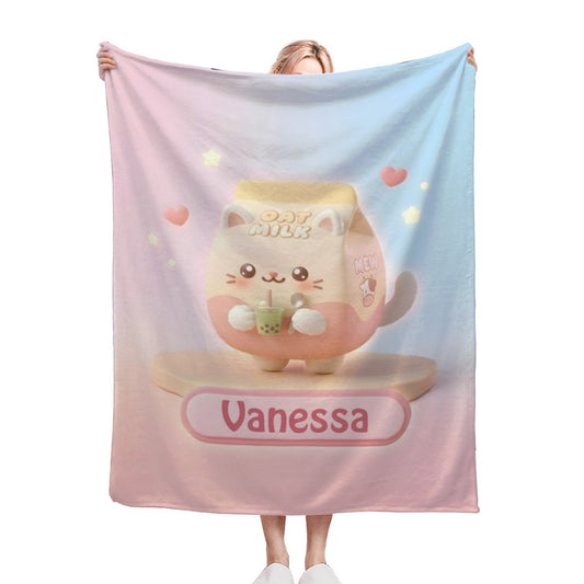Pastel blanket with pink-and-blue sides and cute bunny graphic, “Vanessa” label