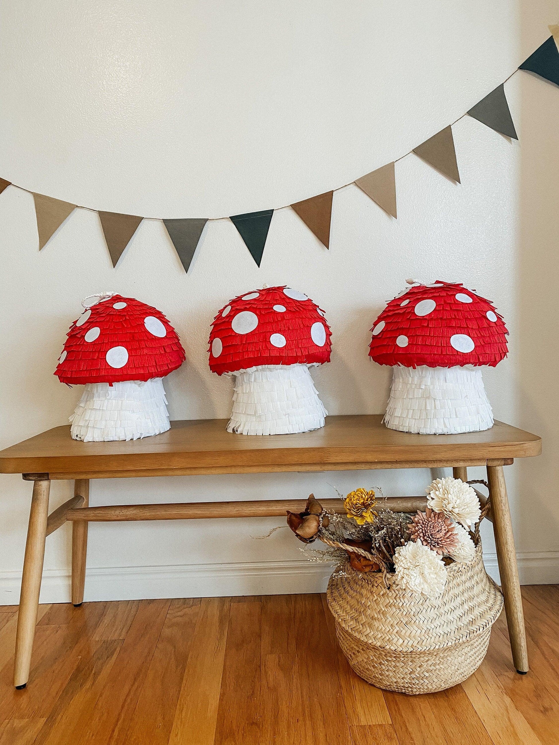 Set of three mushroom piñatas: red caps with white spots and white stems
