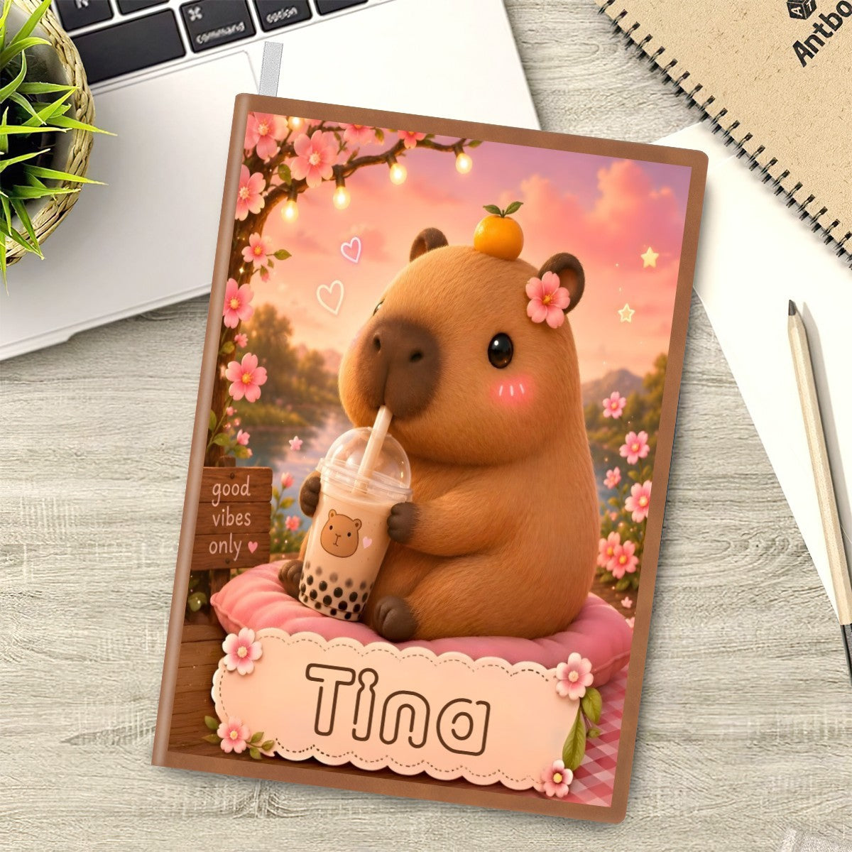 A5 notebook with bear bubble-tea cover, shown at an angle on a desk