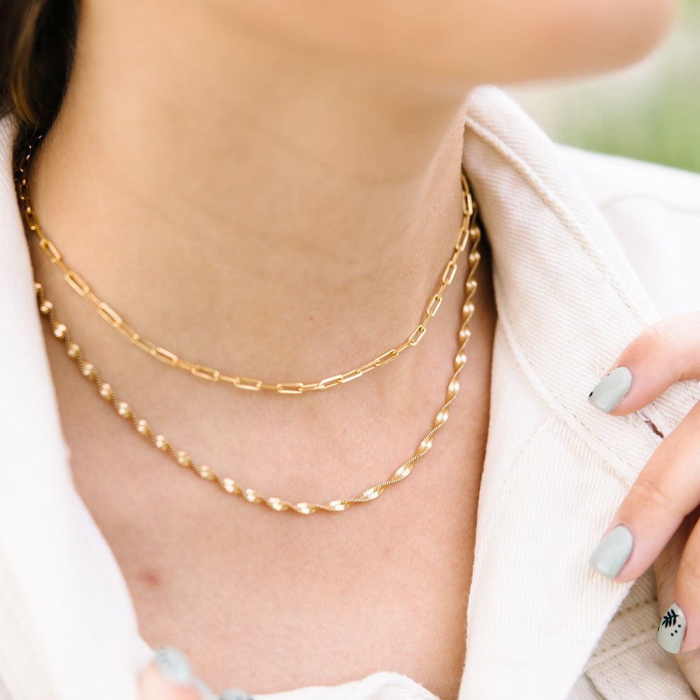 Gold-filled twist necklace layered with a link chain.
