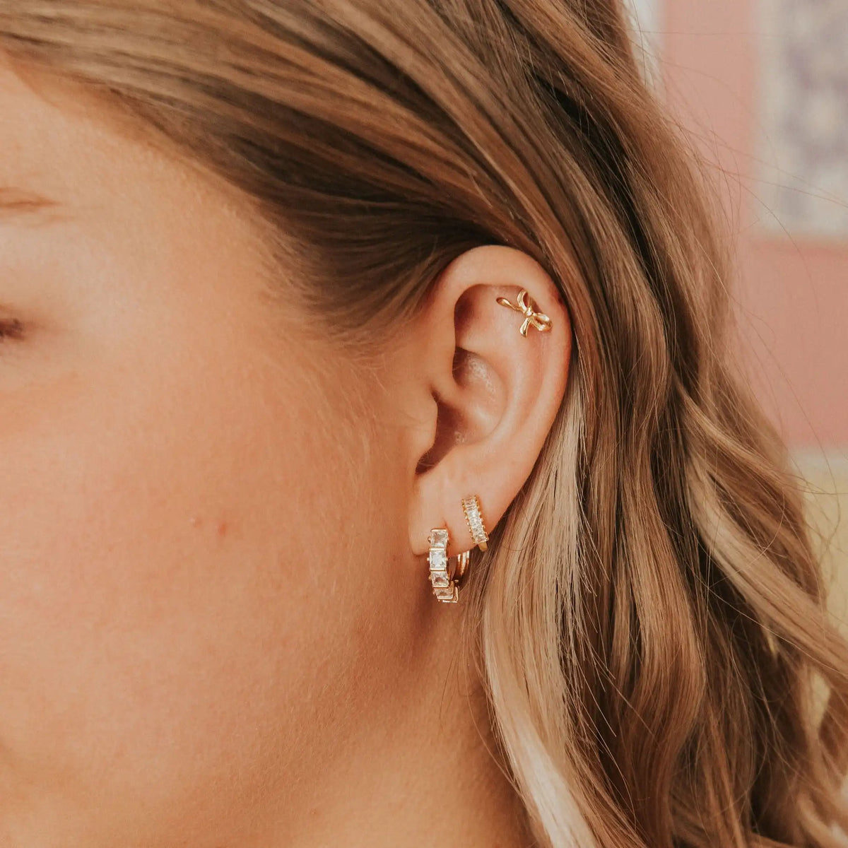 Gold-filled diamond hoops worn with a gold ear cuff