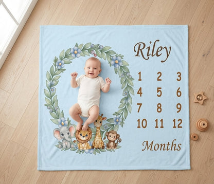 Light blue baby milestone blanket with “Riley” and month numbers, animal wreath design