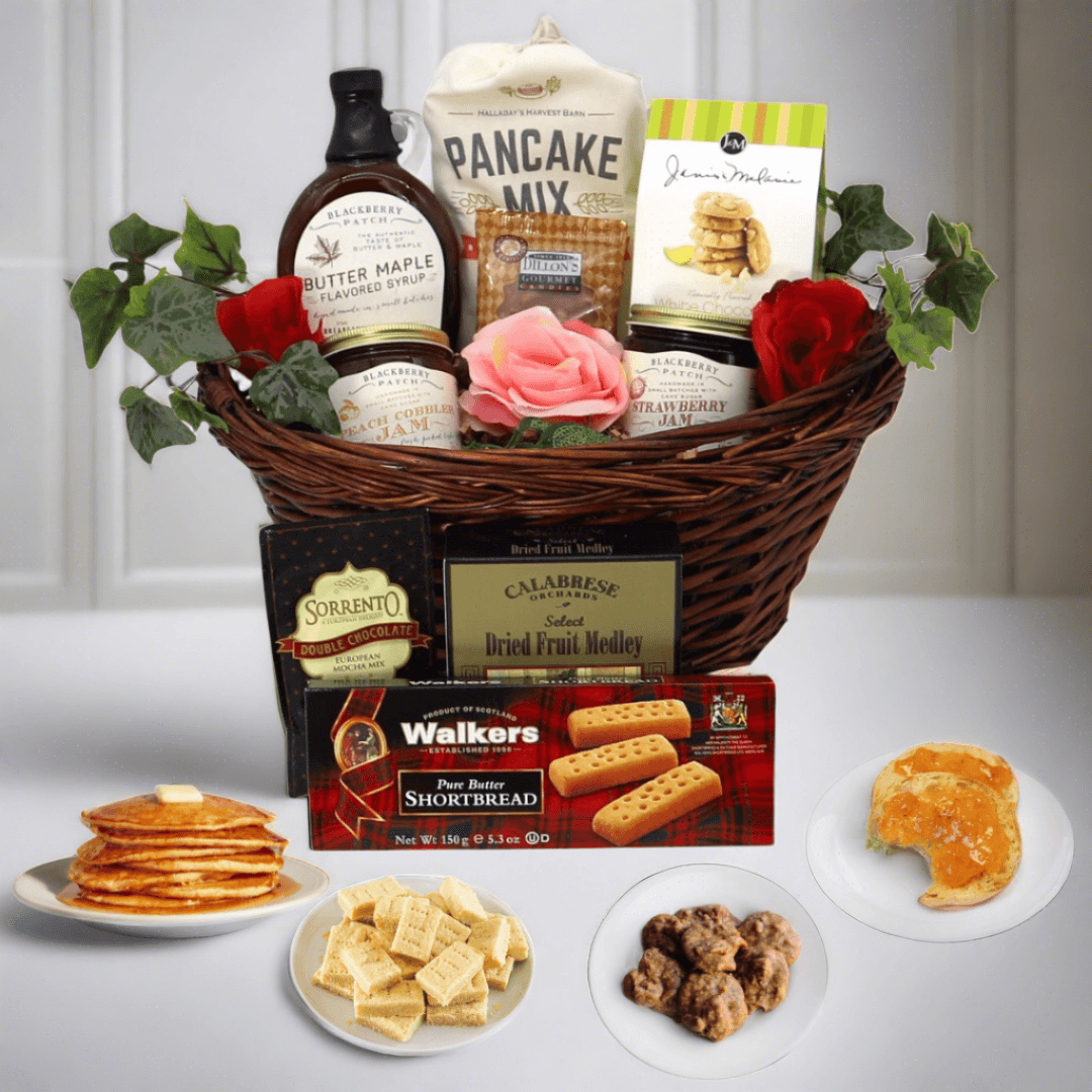 Wicker breakfast gift basket with pancake mix, syrup bottle, and fruit preserves