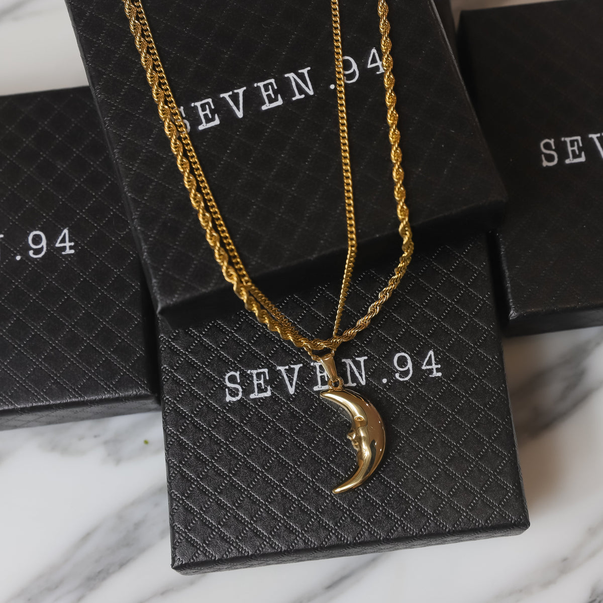 Gold crescent moon pendant necklace set with hanging moon charm