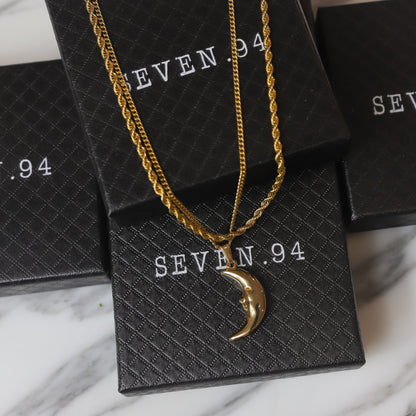 Gold crescent moon pendant necklace set with hanging moon charm