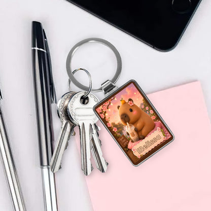 Silver keychain with square photo charm and metal rings with attached keys