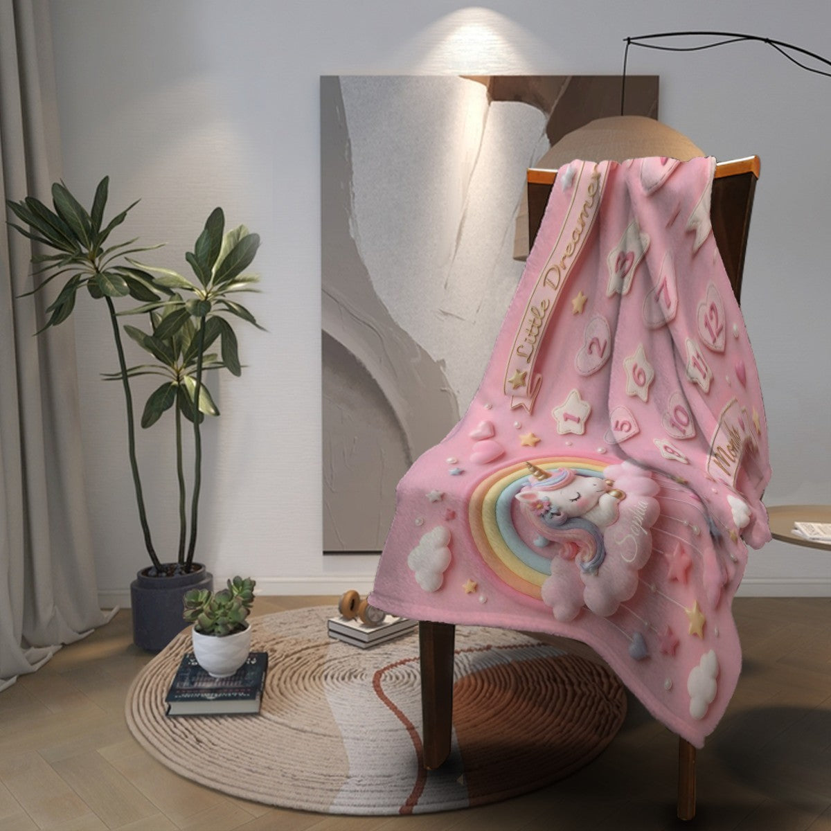 Pink unicorn and rainbow fleece blanket draped over chair