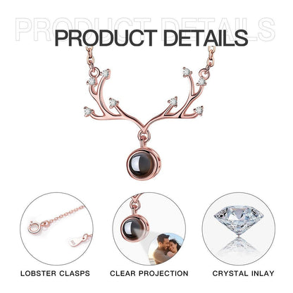 Rose gold antler projection necklace pendant with round locket and crystal accent stones