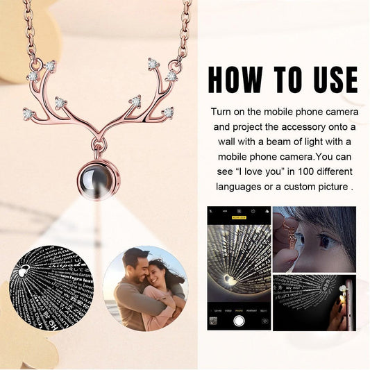 Rose gold antler pendant necklace with round projection locket and crystal details