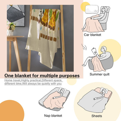 Blanket with safari animal print hanging over furniture, showing brown trim pattern