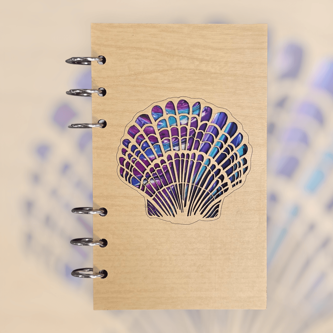 A6 refillable journal on kraft beige with purple seashell cover art and silver binder rings