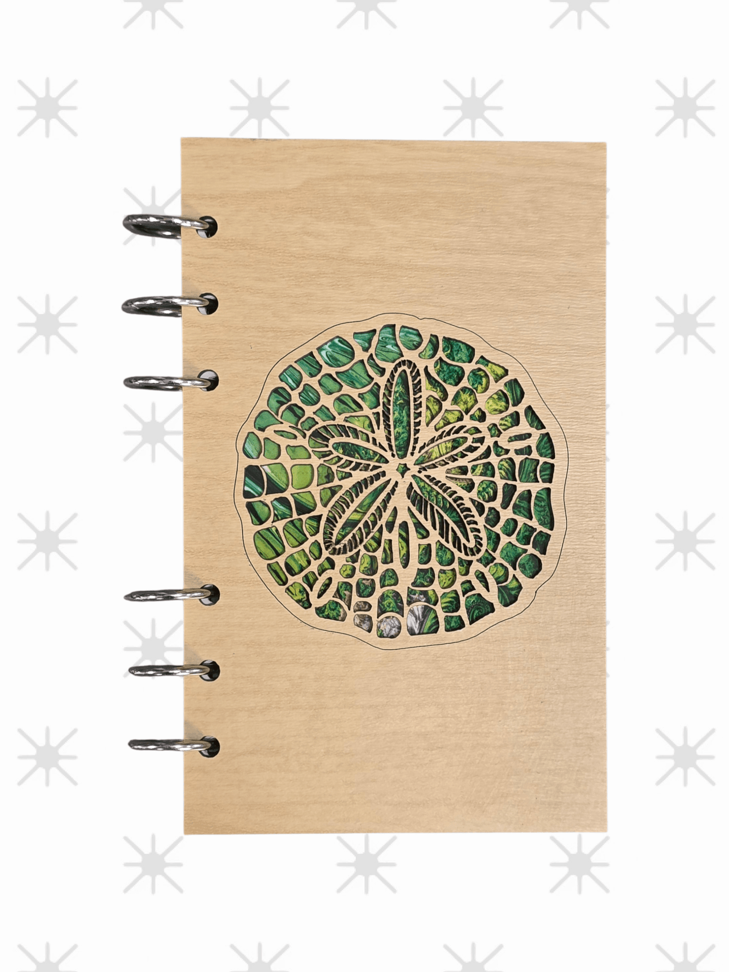 A6 refillable wood notebook journal close-up of green sand dollar cover art and metal rings