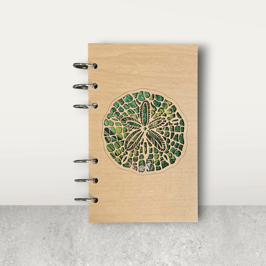 A6 refillable wood notebook journal with sand dollar illustration and five metal binder rings