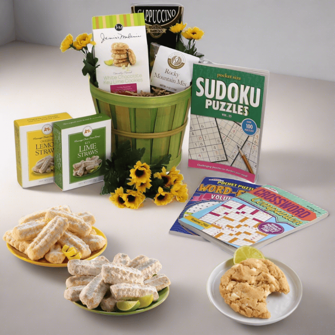 Gift basket with green bamboo-style container, sunflower accents, and assorted snack boxes