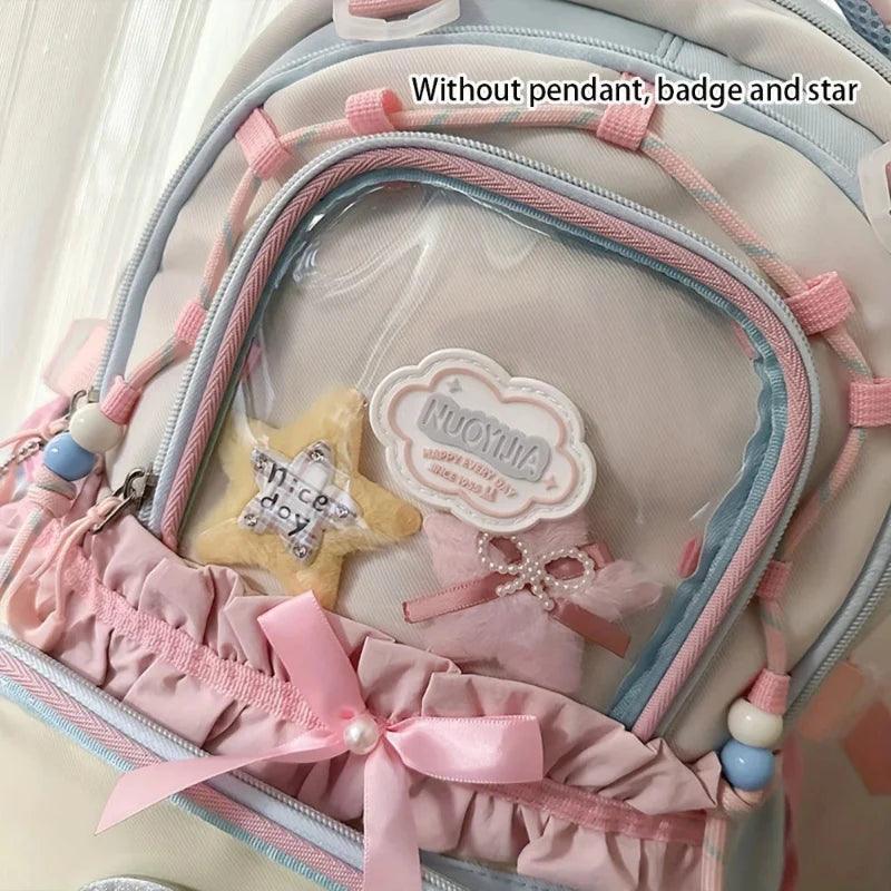 Pastel backpack interior panel with clear pocket, ruffle trim, and plush key charm