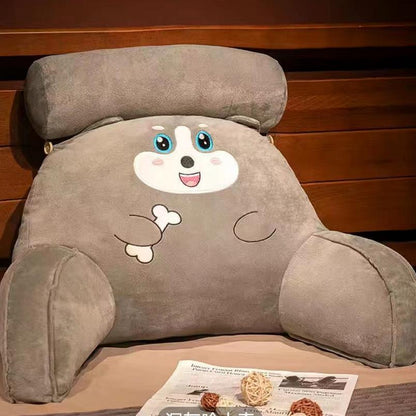 Light gray plush reading pillow with smiling panda face and soft paw details