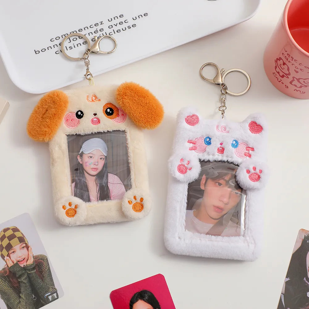 Plush dog photo card holder keychain with beige fur, orange ears, and photo window